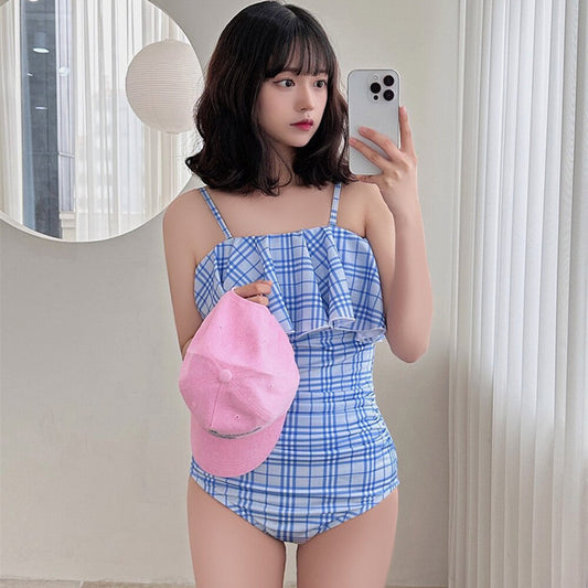 One-piece swimming costume, blue striped, stylish